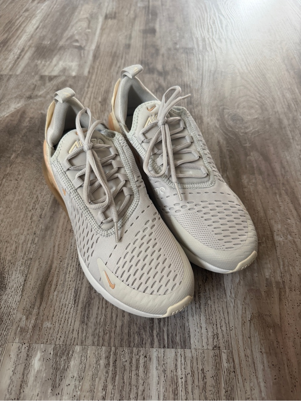 Nike Neutral Beige Sneakers with Pale Peach Accents